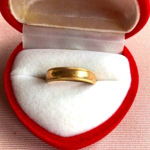 Real solid 10k gold band.